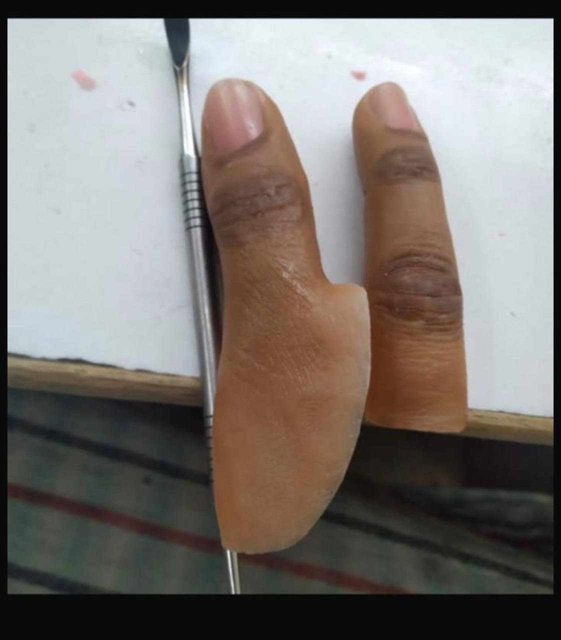 SILICON  THUMB